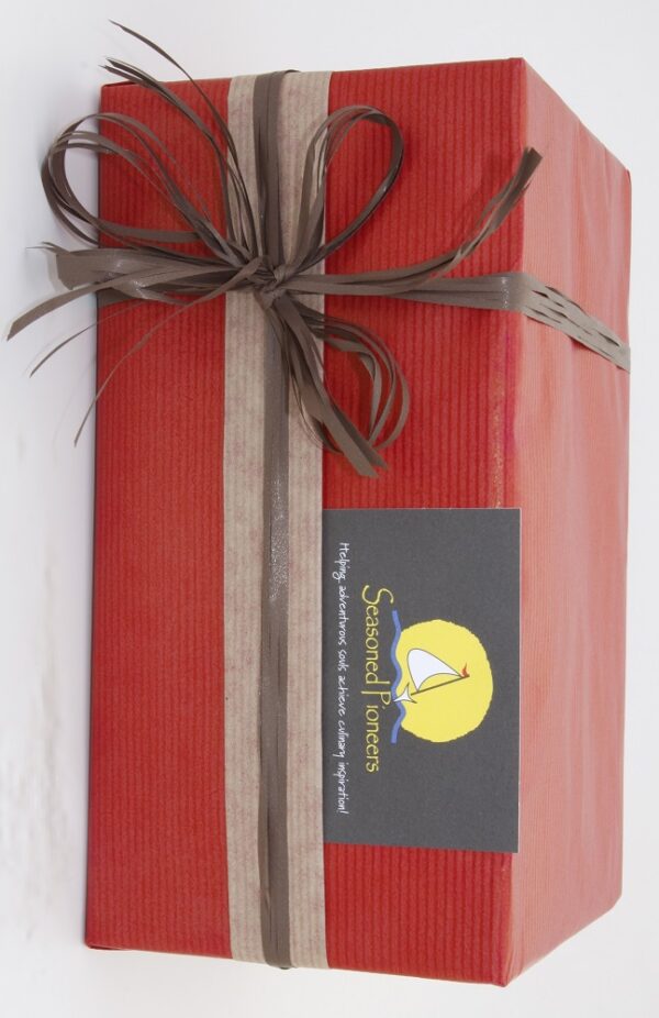 Seasoned Pioneers Gift Wrap in Red wrapping paper
